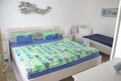 Ein Bett oder Betten in einem Zimmer der Unterkunft Seestern