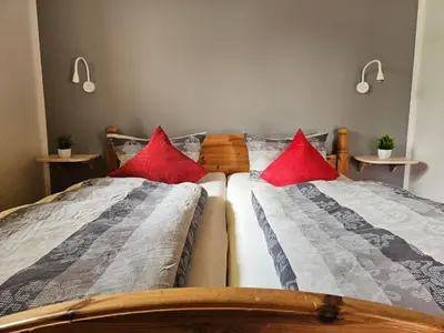 Ein Bett oder Betten in einem Zimmer der Unterkunft Ferienapartments Am Deich in Zingst
