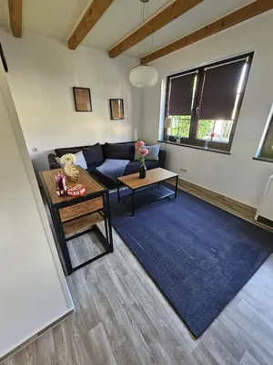 Ein Sitzbereich in der Unterkunft Ferienapartments Am Deich in Zingst