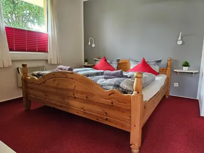 Ein Bett oder Betten in einem Zimmer der Unterkunft Ferienapartments Am Deich in Zingst