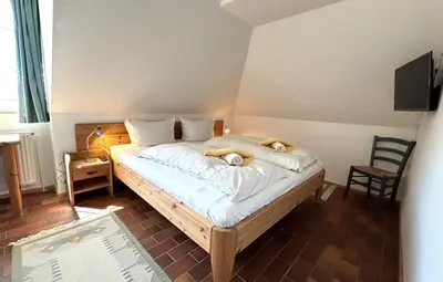 Ein Bett oder Betten in einem Zimmer der Unterkunft Resi P6