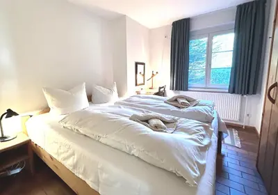 Ein Bett oder Betten in einem Zimmer der Unterkunft Resi M3