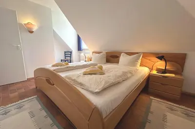 Ein Bett oder Betten in einem Zimmer der Unterkunft Resi C6