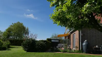 Ein Garten an der Unterkunft Ferienhaus Mantuja Wohnung I