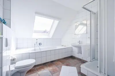 Ein Badezimmer in der Unterkunft Rauchschwalbe
