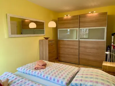 Ein Bett oder Betten in einem Zimmer der Unterkunft Utkiek 2