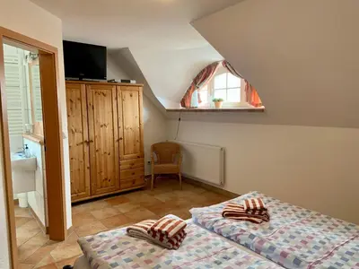 Ein Bett oder Betten in einem Zimmer der Unterkunft Sturmvogel
