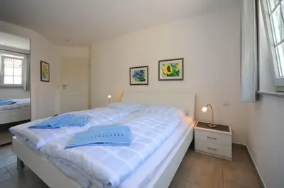 Ein Bett oder Betten in einem Zimmer der Unterkunft Donnerkeil