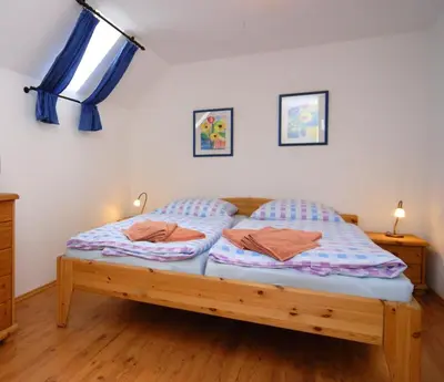 Ein Bett oder Betten in einem Zimmer der Unterkunft Seestern - b48412