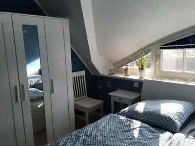 Ein Bett oder Betten in einem Zimmer der Unterkunft Steentje