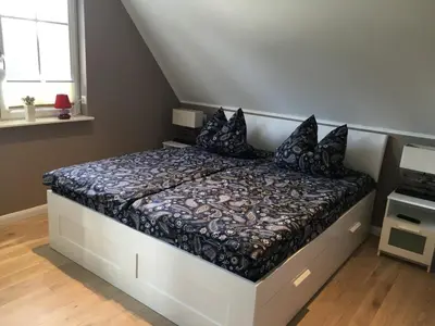 Ein Bett oder Betten in einem Zimmer der Unterkunft Steentje