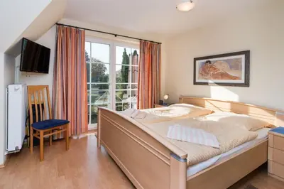 Ein Bett oder Betten in einem Zimmer der Unterkunft Meeresglück - b48479