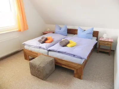 Ein Bett oder Betten in einem Zimmer der Unterkunft Parkblick - b49016