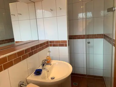 Ein Badezimmer in der Unterkunft Leuchtturm - b48402