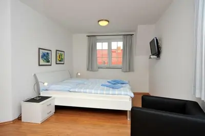 Ein Bett oder Betten in einem Zimmer der Unterkunft Hühnergott