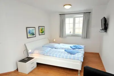 Ein Bett oder Betten in einem Zimmer der Unterkunft Hühnergott