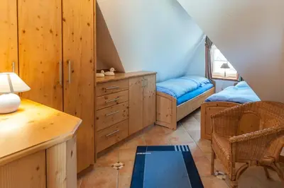Ein Bett oder Betten in einem Zimmer der Unterkunft Strandrose - b49000