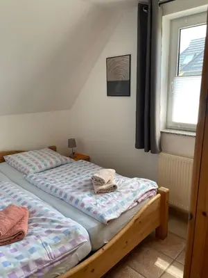 Ein Bett oder Betten in einem Zimmer der Unterkunft Kranich - b48451