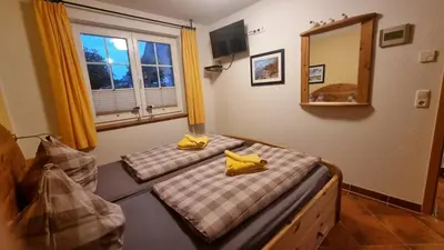 Ein Bett oder Betten in einem Zimmer der Unterkunft Kleiner Pirat