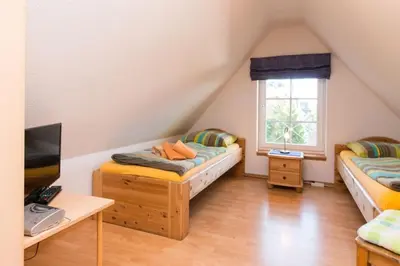 Ein Bett oder Betten in einem Zimmer der Unterkunft Großer Pirat