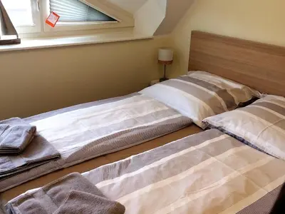 Ein Bett oder Betten in einem Zimmer der Unterkunft Ankerplatz - b49613