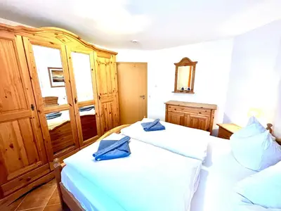 Ein Bett oder Betten in einem Zimmer der Unterkunft Victoria