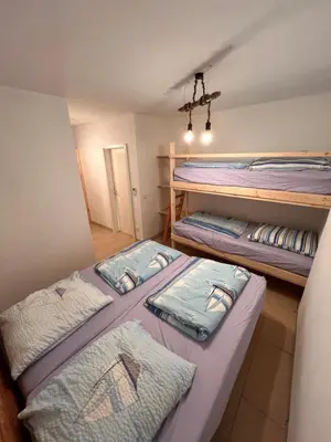 Ein Bett oder Betten in einem Zimmer der Unterkunft Zum Wall