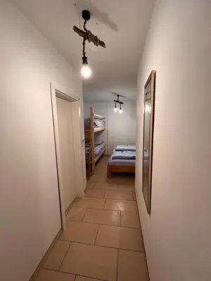Ein Bett oder Betten in einem Zimmer der Unterkunft Zum Wall