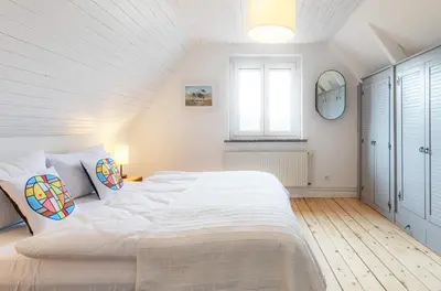 Ein Bett oder Betten in einem Zimmer der Unterkunft Ferienhaus 