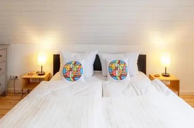 Ein Bett oder Betten in einem Zimmer der Unterkunft Ferienhaus 