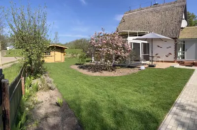 Ein Garten an der Unterkunft Ferienhaus 