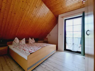 Ein Bett oder Betten in einem Zimmer der Unterkunft Pension & Wirtshaus ''Tun Eikkoter'' Eichkatze