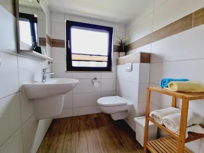 Ein Badezimmer in der Unterkunft Pension & Wirtshaus ''Tun Eikkoter'' Eikboom