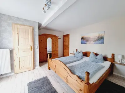 Ein Bett oder Betten in einem Zimmer der Unterkunft Pension & Wirtshaus ''Tun Eikkoter'' Kobel II