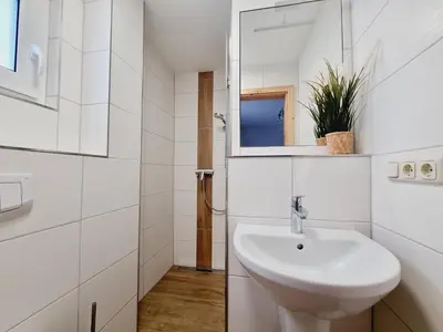 Ein Badezimmer in der Unterkunft Pension & Wirtshaus ''Tun Eikkoter'' Kobel II