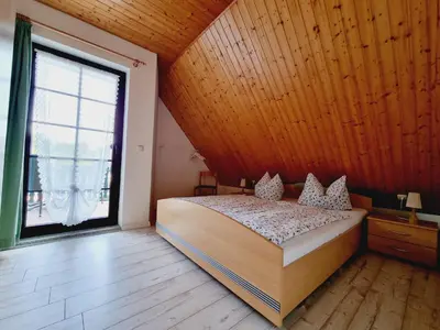 Ein Bett oder Betten in einem Zimmer der Unterkunft Pension & Wirtshaus ''Tun Eikkoter'' Eichkater