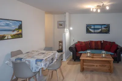 Ein Sitzbereich in der Unterkunft Bodden Paradise Cottage - b65141