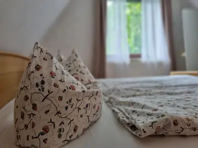 Ein Bett oder Betten in einem Zimmer der Unterkunft Pension & Wirtshaus ''Tun Eikkoter'' Haselnöt