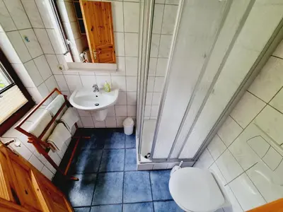 Ein Badezimmer in der Unterkunft Pension & Wirtshaus ''Tun Eikkoter'' Haselnöt