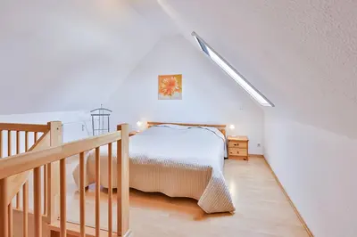 Ein Bett oder Betten in einem Zimmer der Unterkunft Ferienwohnung Nr 7