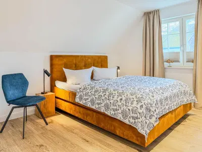 Ein Bett oder Betten in einem Zimmer der Unterkunft Darss - Duett 2