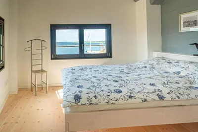Ein Bett oder Betten in einem Zimmer der Unterkunft Eismöwe