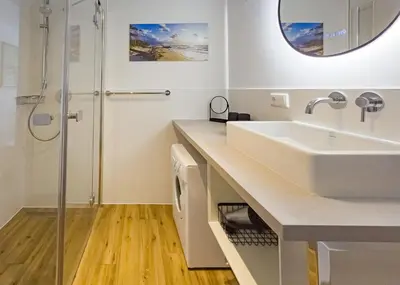 Ein Badezimmer in der Unterkunft Küstenkajüte Whg 5