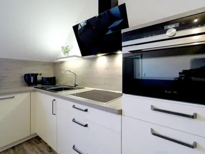 Küche/Küchenzeile in der Unterkunft Ferienwohnung Brise