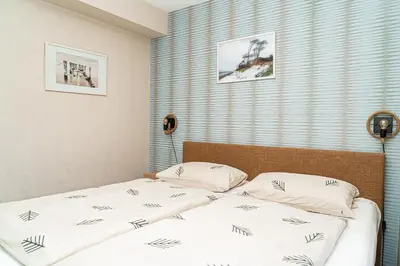 Ein Bett oder Betten in einem Zimmer der Unterkunft Feriendomizil Prerow