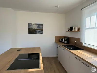 Küche/Küchenzeile in der Unterkunft Ferienhaus Hornhecht