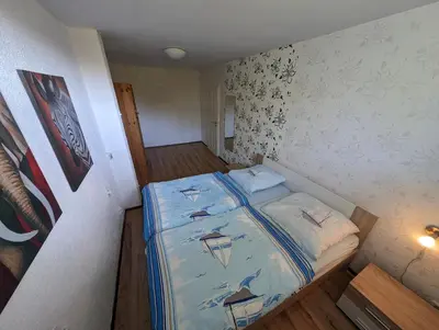 Ein Bett oder Betten in einem Zimmer der Unterkunft Das Schilfrohr
