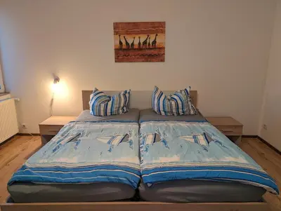 Ein Bett oder Betten in einem Zimmer der Unterkunft Das Schilfrohr