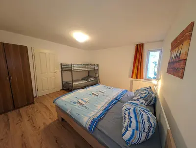 Ein Bett oder Betten in einem Zimmer der Unterkunft Das Schilfrohr