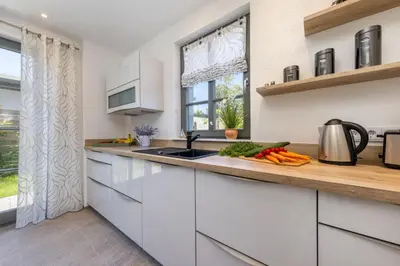 Küche/Küchenzeile in der Unterkunft Ferienhaus Strandkajüte